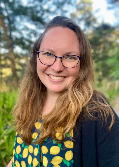 photo of Rebecca Adkins outdoors, smiling