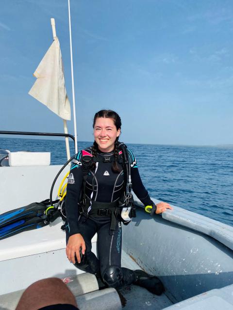 a woman on a sailboat